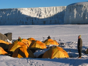 Though we weren't able to camp at this site, the yellow tents were a welcome vision! (photo courtesy of Tusker Trails)
